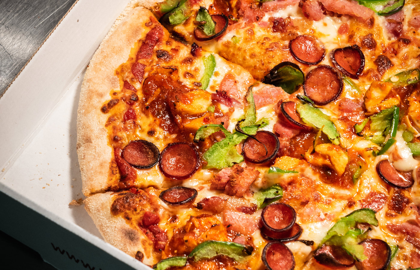 A spread of Little O's pizzas and sides